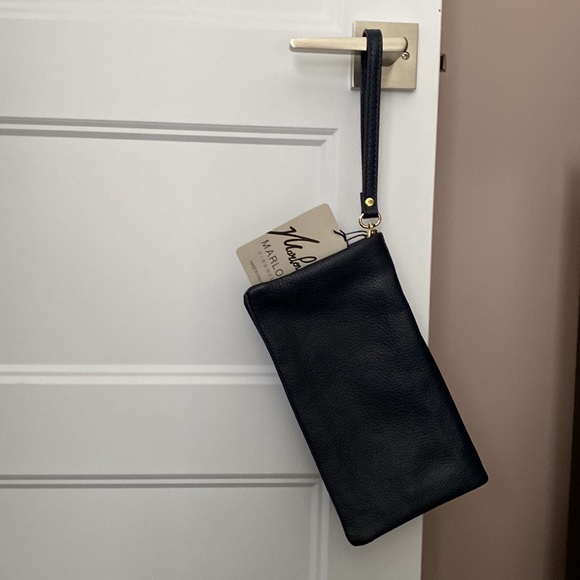 New, never worn navy blue Marlin Firenze leather wristlet/clutch. - Picture 5 of 7